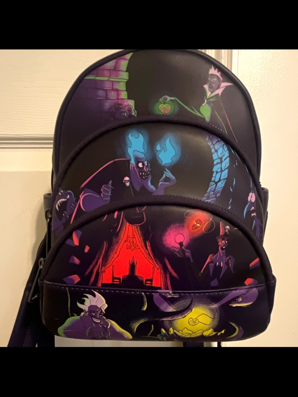 Loungefly Black Haunted Villains Mini Backpack with Neon Accents